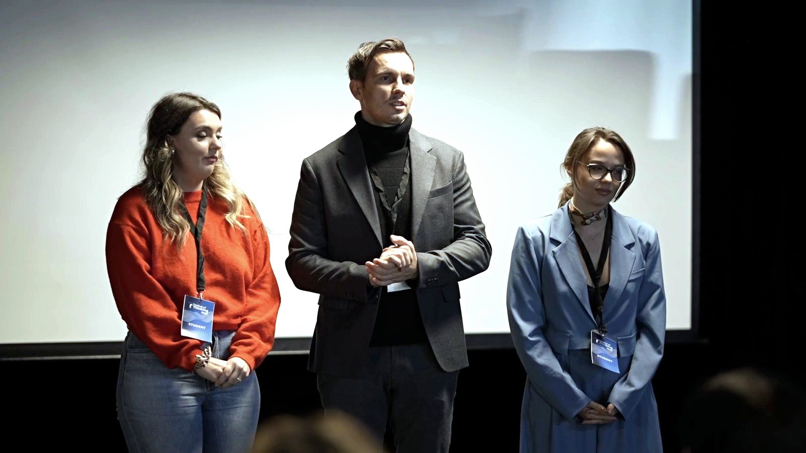 Three participants on stage